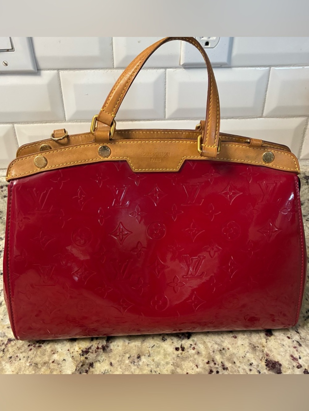 Louis Vuitton Brea MM bag in red patent leather